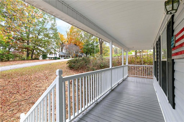 wooden terrace featuring a porch