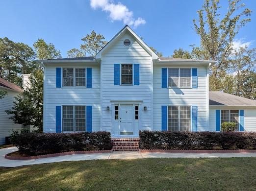 colonial house with a front yard