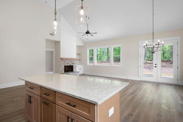160 Doris Path, Dallas, GA 30157 - kitchen featuring dark wood-style flooring, baseboards, open floor plan, ceiling fan, and hanging light fixtures