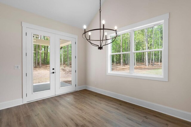 160 Doris Path, Dallas, GA 30157 - unfurnished dining area featuring french doors, a chandelier, baseboards, wood finished floors, and vaulted ceiling