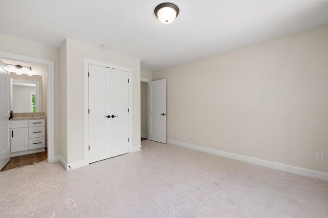 160 Doris Path, Dallas, GA 30157 - unfurnished bedroom featuring a closet, baseboards, and ensuite bathroom