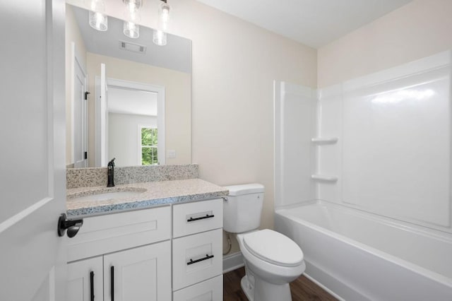 160 Doris Path, Dallas, GA 30157 - bathroom featuring wood finished floors, toilet, vanity, and  shower combination