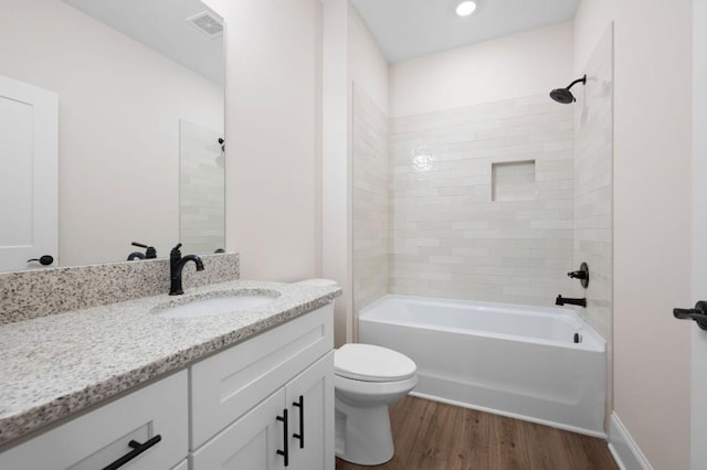 160 Doris Path, Dallas, GA 30157 - bathroom with wood finished floors, toilet, vanity, and shower / tub combination