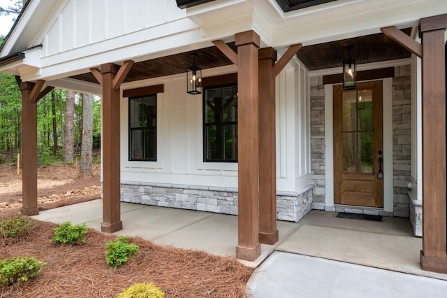 160 Doris Path, Dallas, GA 30157 - view of exterior entry with board and batten siding, covered porch, and stone siding
