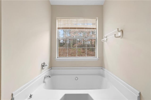 bathroom featuring a tub