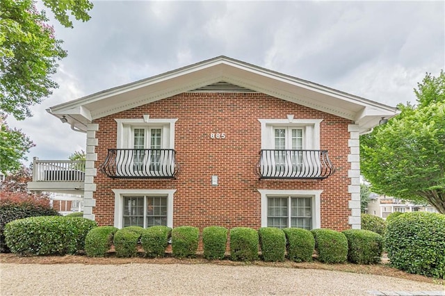 view of property exterior with a balcony