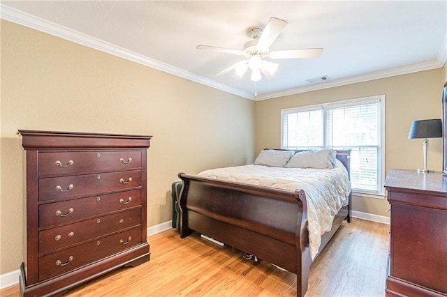 bedroom featuring ceiling fan, crown molding, and light wood-type flooring