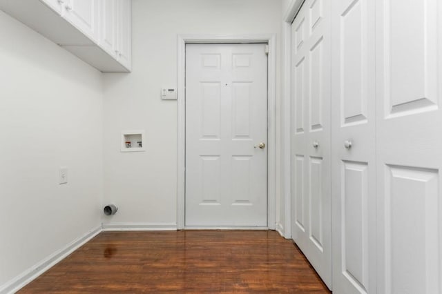 laundry room with baseboards, cabinet space, washer hookup, and dark wood finished floors