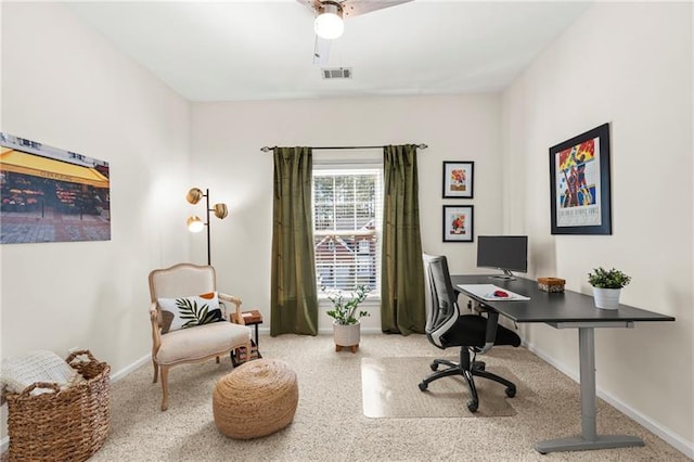 office space featuring carpet floors and baseboards
