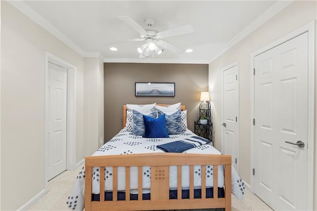 bedroom featuring recessed lighting, baseboards, ornamental molding, light colored carpet, and ceiling fan
