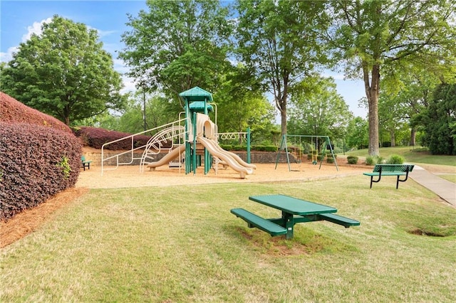 community play area featuring a lawn