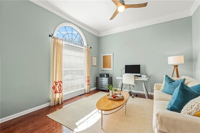 living room featuring crown molding, a ceiling fan, baseboards, wood finished floors, and an office area