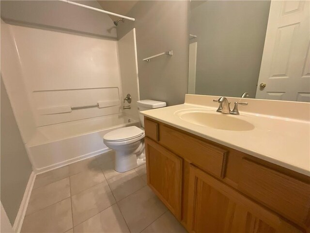 full bathroom with tile patterned floors, toilet, shower / bathing tub combination, and vanity