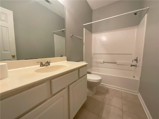 full bathroom with tile patterned flooring, vanity, shower / bathing tub combination, and toilet