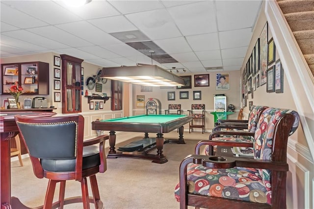 rec room with a paneled ceiling, pool table, and carpet floors
