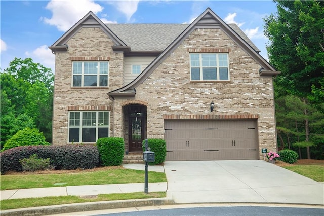 3920 Baverton Dr, Suwanee, GA 30024 - view of front facade featuring brick siding, an attached garage, and concrete driveway
