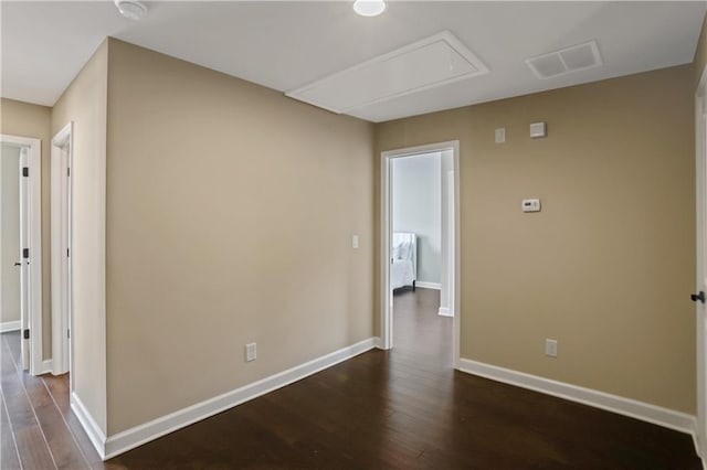3920 Baverton Dr, Suwanee, GA 30024 - empty room featuring attic access, dark wood finished floors, and baseboards