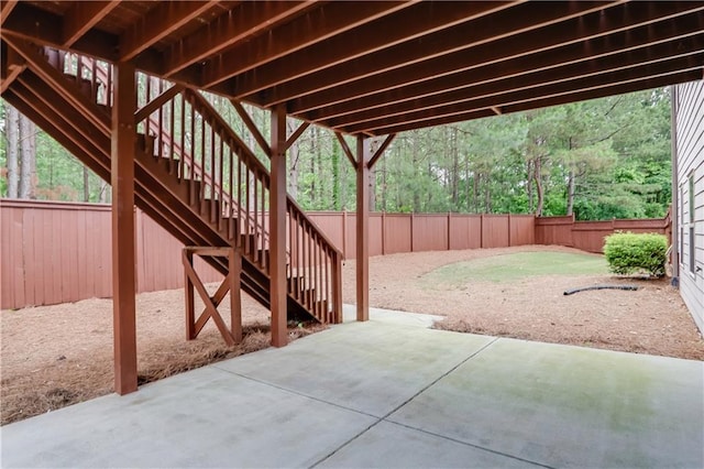 3920 Baverton Dr, Suwanee, GA 30024 - fenced backyard with a patio and stairway