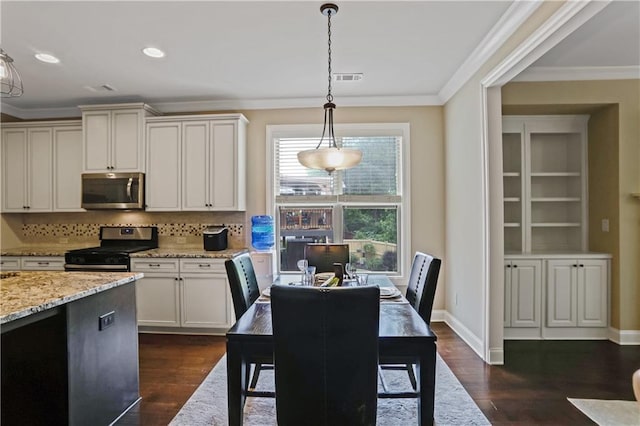 3920 Baverton Dr, Suwanee, GA 30024 - dining area with ornamental molding, dark wood-type flooring, baseboards, and recessed lighting