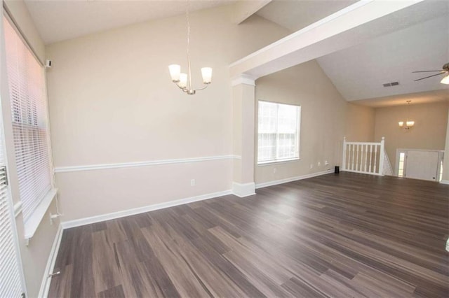 interior space with ceiling fan with notable chandelier, lofted ceiling, and dark hardwood / wood-style floors