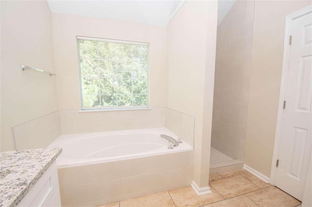 bathroom with vanity, separate shower and tub, and tile patterned floors