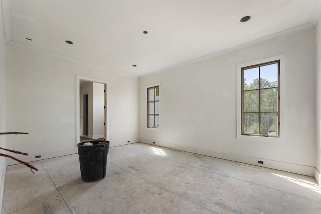 spare room featuring baseboards