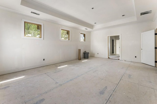 empty room with a raised ceiling