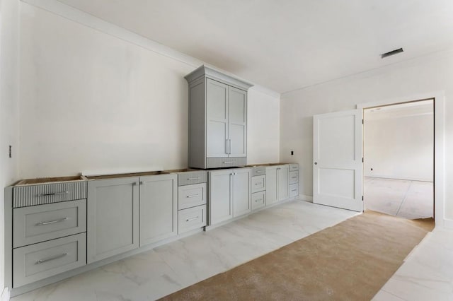 bathroom featuring marble finish floors