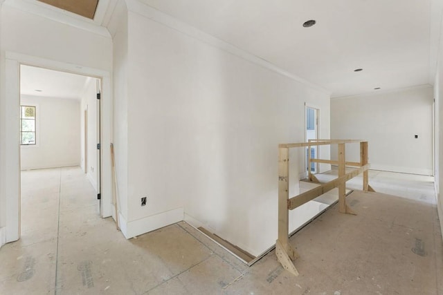 corridor featuring ornamental molding