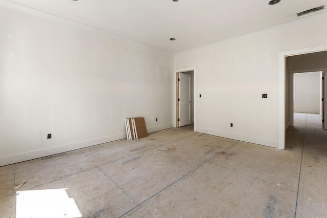 empty room featuring baseboards
