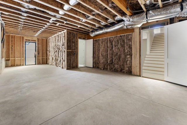 unfinished basement with stairway