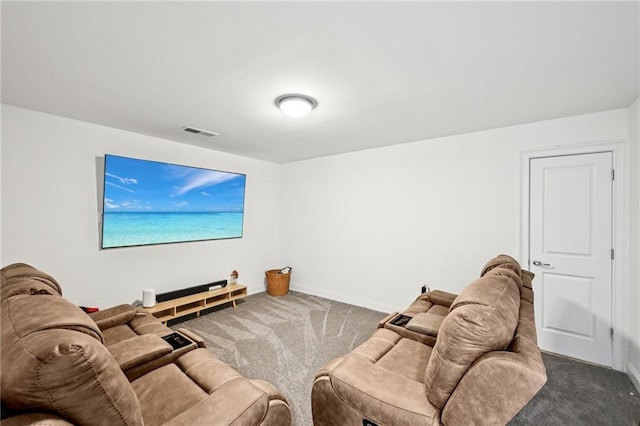carpeted living area with baseboards
