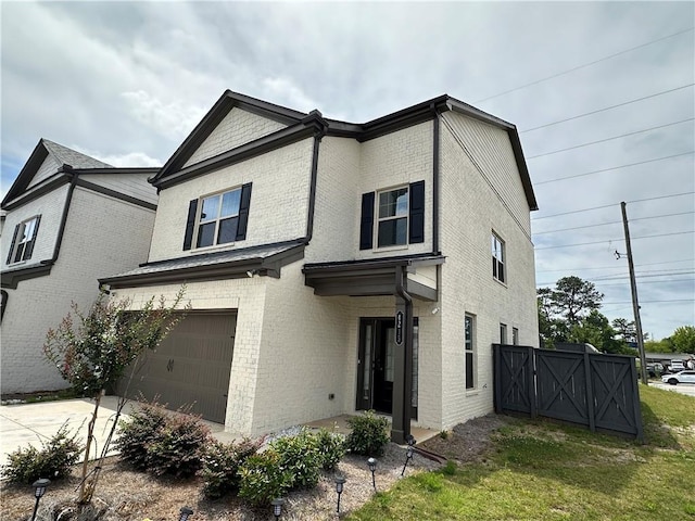 view of front of property featuring a garage