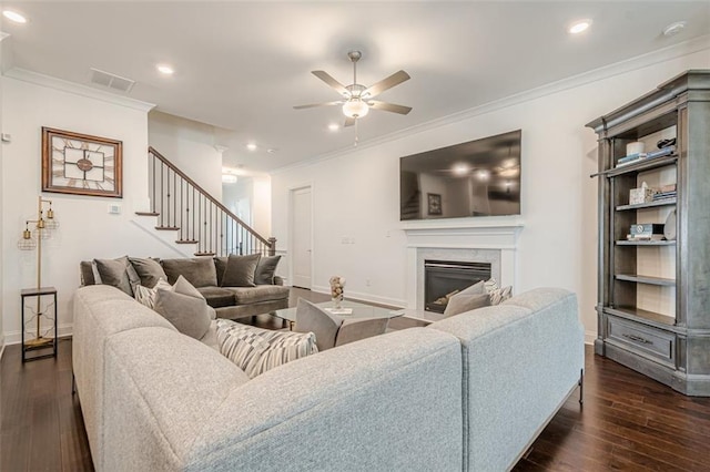 living room featuring stairway, visible vents, dark wood finished floors, recessed lighting, and french doors