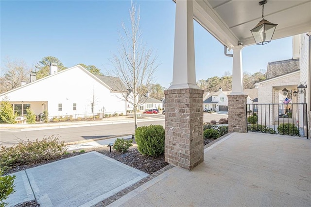 property entrance with french doors and brick siding
