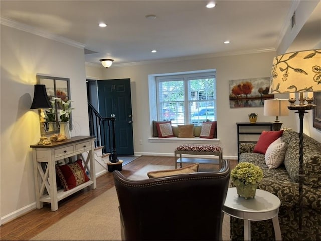 living area with wood finished floors, stairs, baseboards, recessed lighting, and ornamental molding