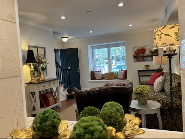 living room with stairs, wood finished floors, crown molding, and recessed lighting