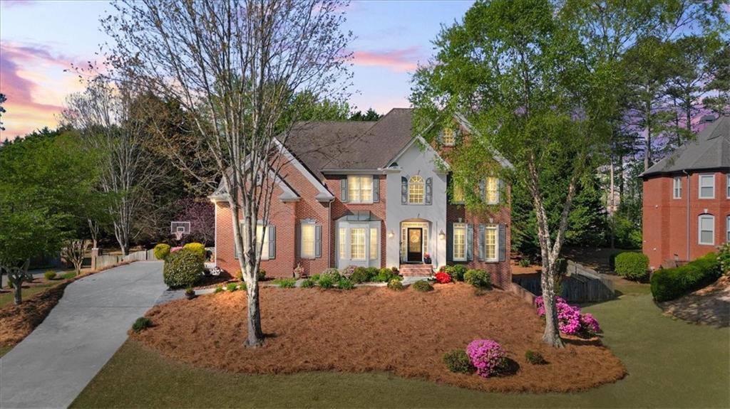 6690 Stillmeadow Dr, Cumming, GA 30040 - view of front of home with driveway
