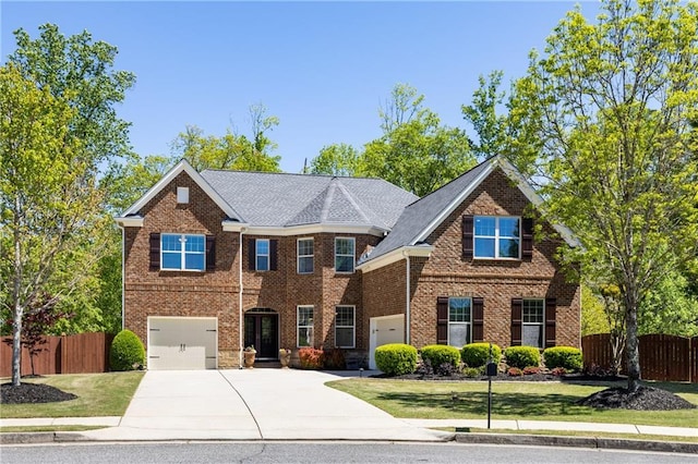 1695 Peyton Farm Dr, Alpharetta, GA 30004 - view of front of property featuring driveway, a garage, and brick siding
