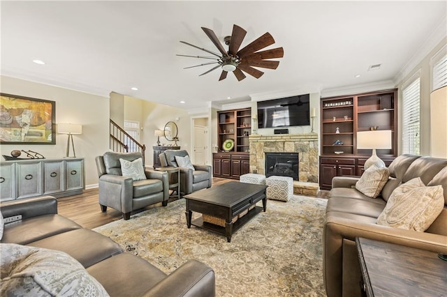 1695 Peyton Farm Dr, Alpharetta, GA 30004 - living room with ceiling fan, ornamental molding, a fireplace, wood finished floors, and recessed lighting