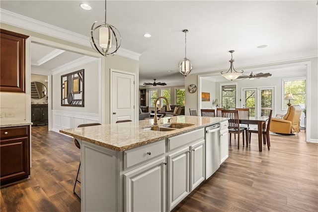 1695 Peyton Farm Dr, Alpharetta, GA 30004 - kitchen featuring a sink, dishwasher, a ceiling fan, dark wood-type flooring, and decorative light fixtures