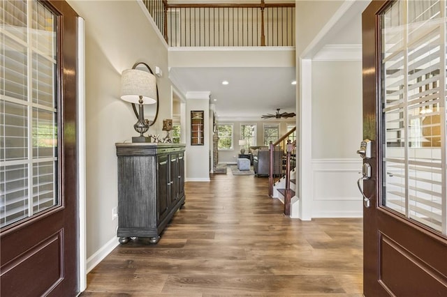 1695 Peyton Farm Dr, Alpharetta, GA 30004 - foyer entrance with stairway, dark wood finished floors, recessed lighting, baseboards, and crown molding