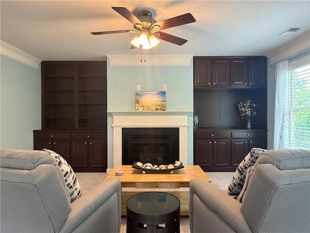 1695 Peyton Farm Dr, Alpharetta, GA 30004 - living room featuring ceiling fan, ornamental molding, and a glass covered fireplace