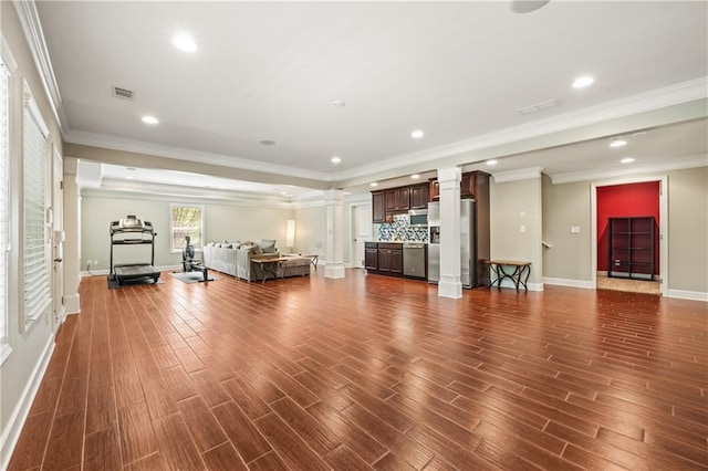 1695 Peyton Farm Dr, Alpharetta, GA 30004 - living area featuring decorative columns, dark wood finished floors, baseboards, recessed lighting, and crown molding