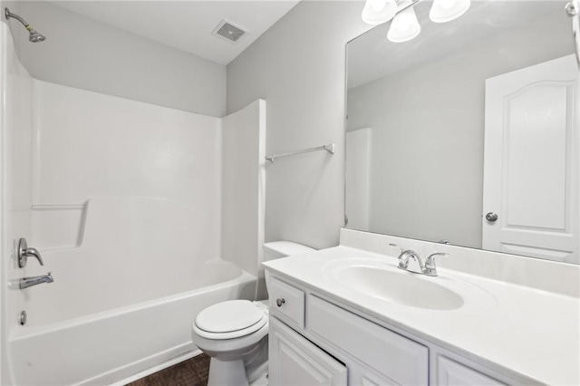 full bath featuring bathing tub / shower combination, wood finished floors, visible vents, toilet, and vanity