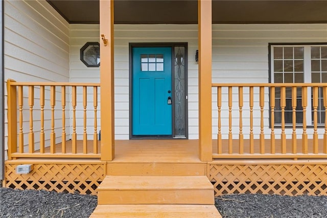 property entrance featuring covered porch