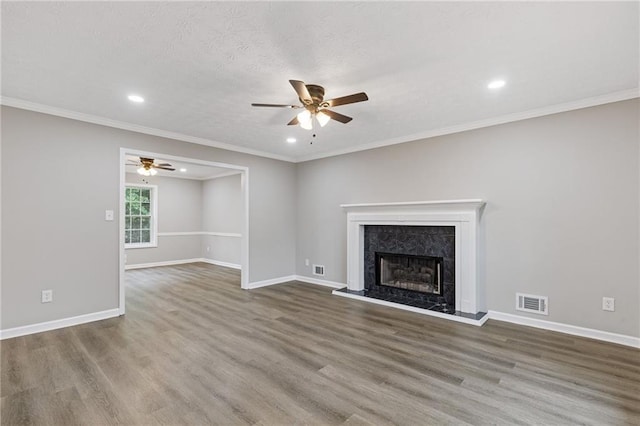 unfurnished living room featuring visible vents, a ceiling fan, and recessed lighting
