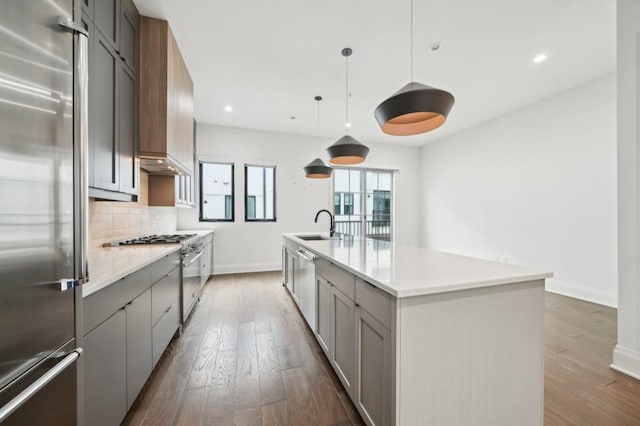 71 Krog St NE, Atlanta, GA 30307 - kitchen featuring high end appliances, gray cabinetry, dark wood-style floors, and recessed lighting