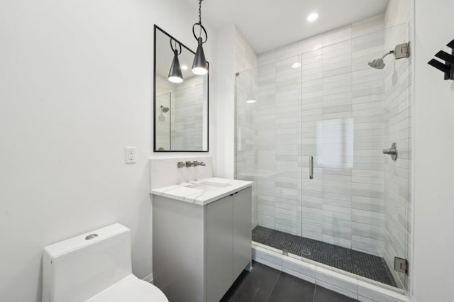 71 Krog St NE, Atlanta, GA 30307 - bathroom with vanity, toilet, a shower stall, and recessed lighting