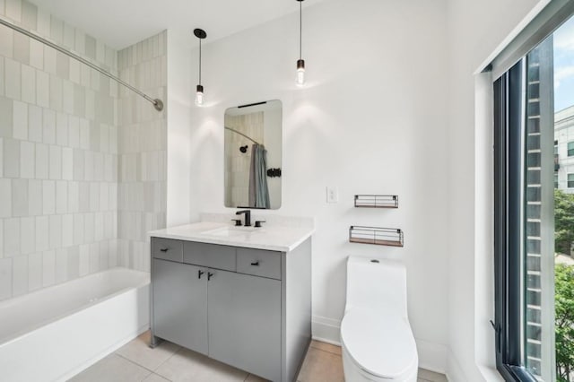 71 Krog St NE, Atlanta, GA 30307 - full bath with toilet,  shower combination, tile patterned flooring, vanity, and baseboards